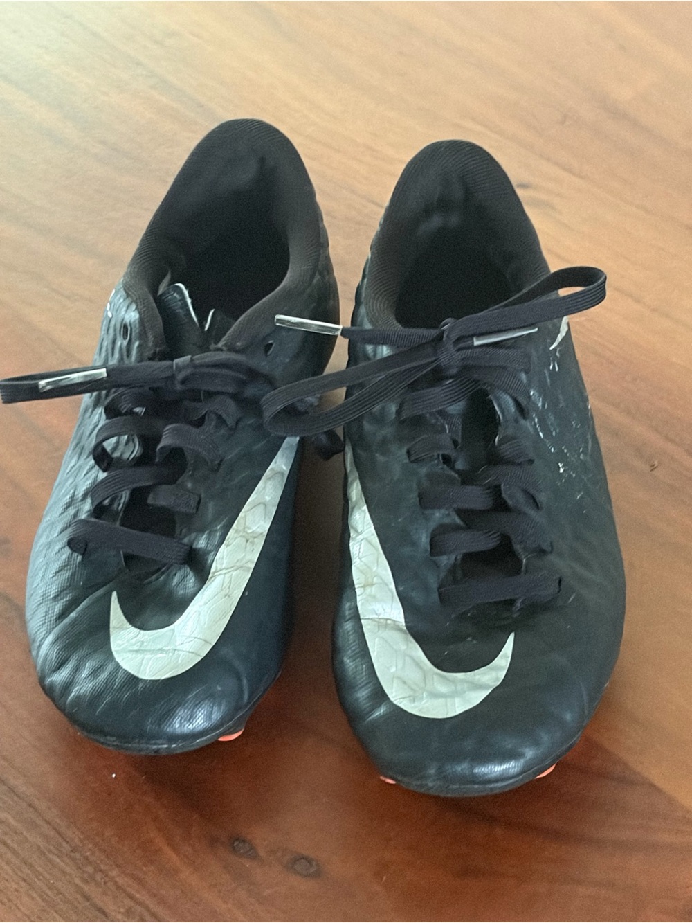 Nike Black Soccer Cleats with White Swoosh Accents kids size 2